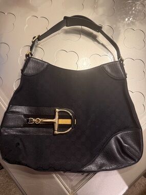 Gucci Black Shoulder Bag with Gold Hardware and Yellow Stripe Accent